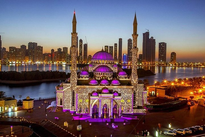 Discover Sharjah's stunning skyline as the majestic King Faisal Mosque illuminates the skyline offering a blend of modernity and tradition that invites exploration and cultural appreciation.